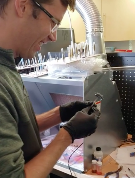 Paul inspects paint on a Spintronics part